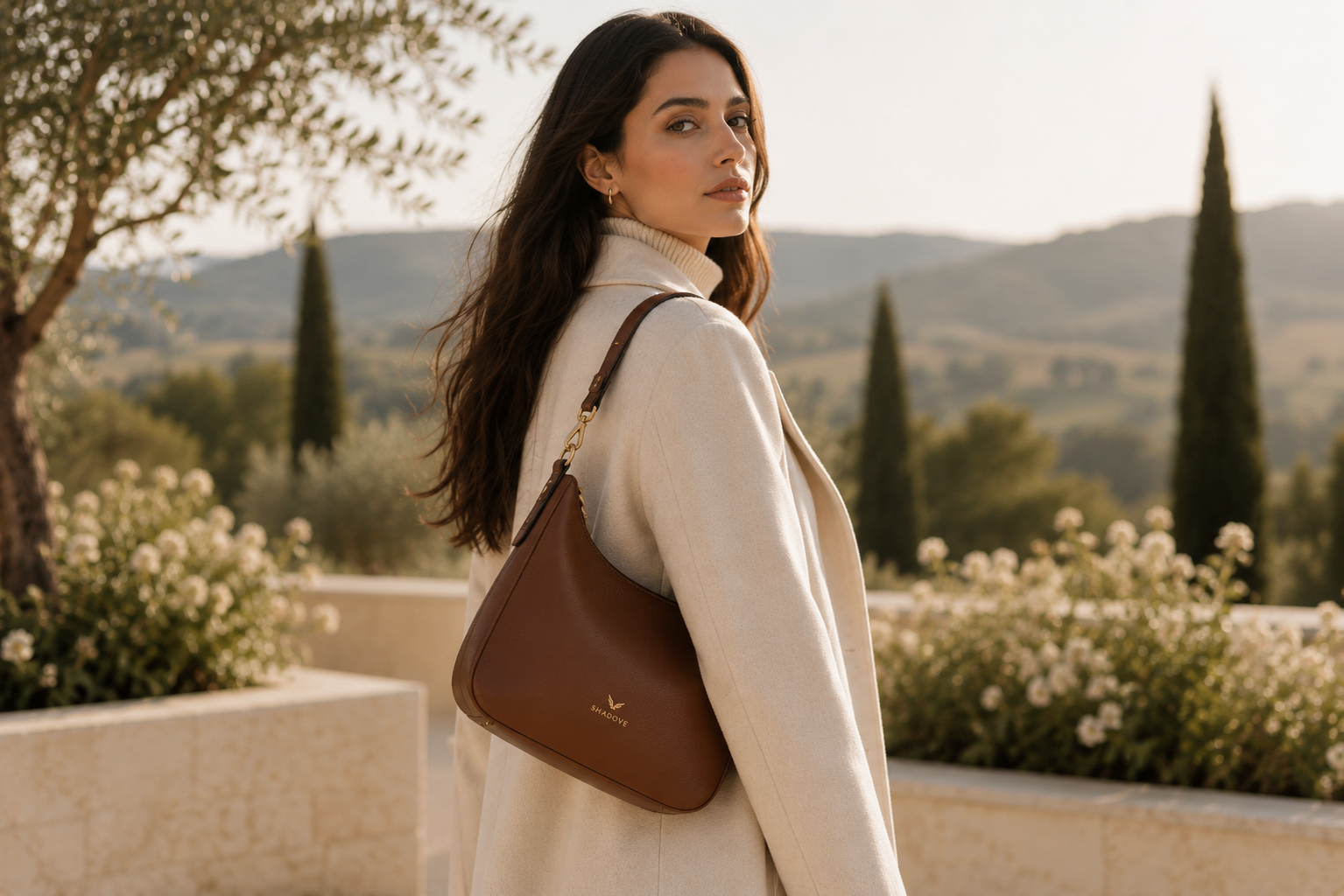 Shoulder bag on natural linen, close editorial crop